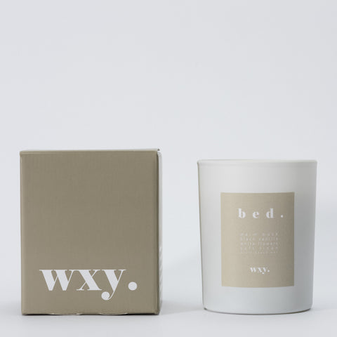 Bed. Candle